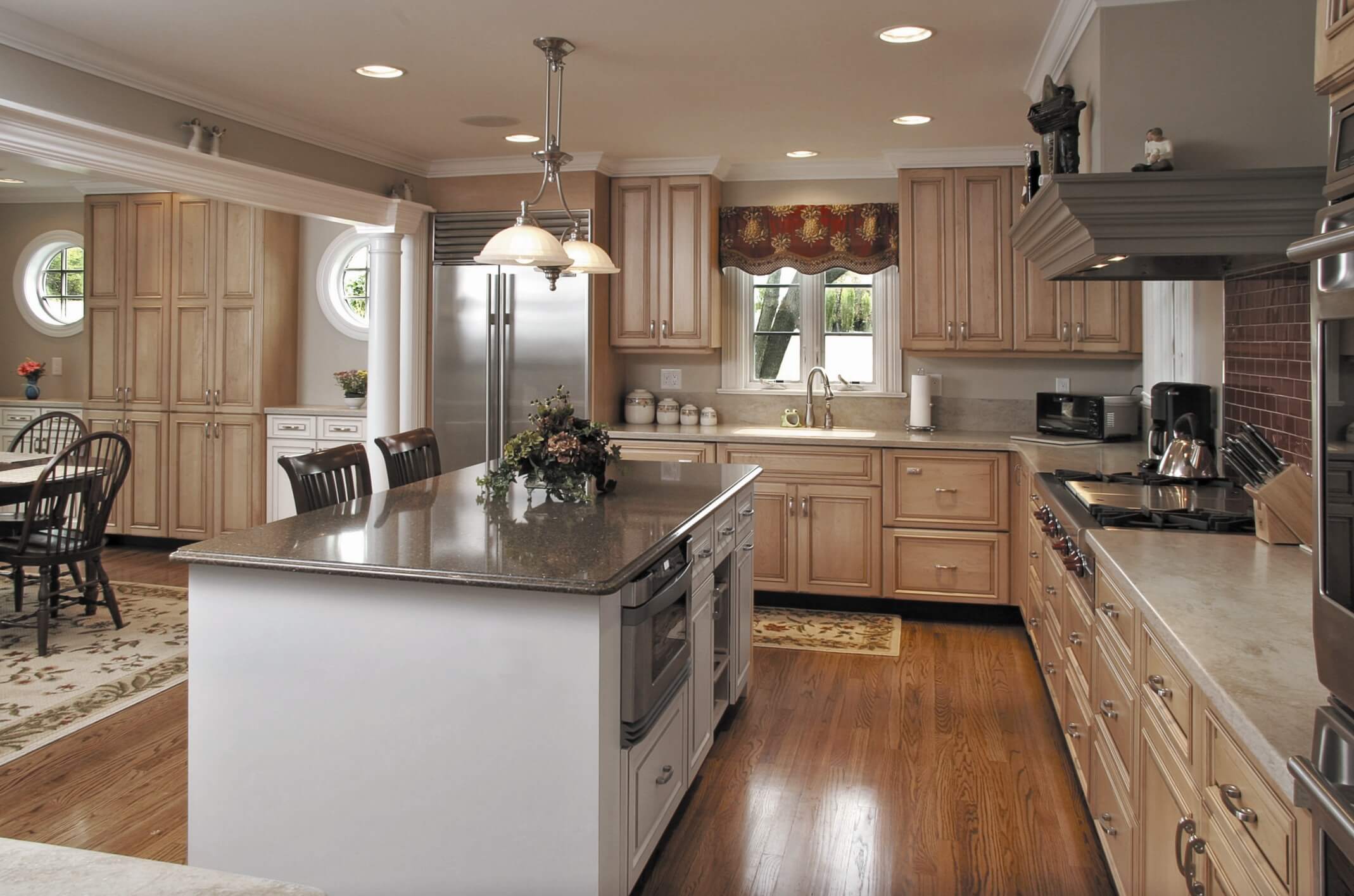 traditional kitchen layout, in the style of hybrid of contemporary and traditional, light bronze and light beige